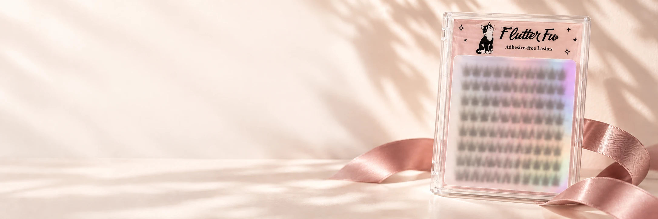 A mystery Flutter Fu adhesive-free lash tray wrapped as a surprise gift